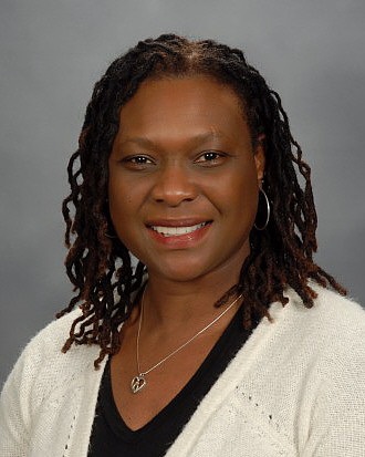 Mrs. Maggy A. Michel Mrs. Maggy A. Michel